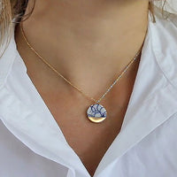 A blue and white porcelain pendant adorned with 24k gold on a delicate 14k gold filled chain, available in different lengths. This necklace is also available with matching earrings. A perfect porcelain anniversary gift jewelry set.
Vintage porcelain jewelry, china blue jewelry, delft jewelry
Handmade by OeiCeramics
A ceramic workshop inspired by the Delft blue ware of the Dutch town of Delft. Delftsblauw
