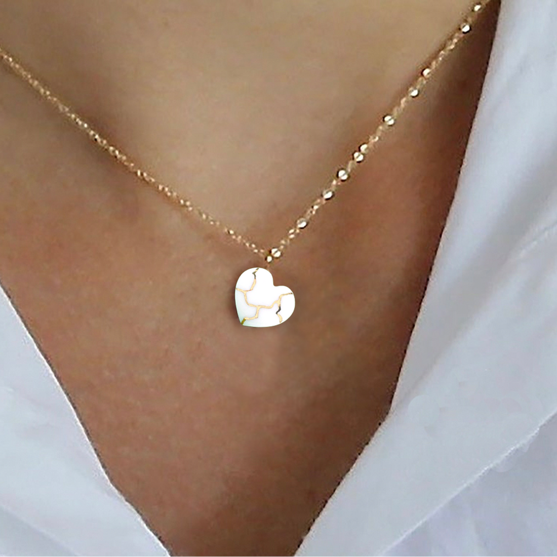 Handmade white porcelain Kintsugi heart necklace with gold crack pendant and 14k gold filled chain