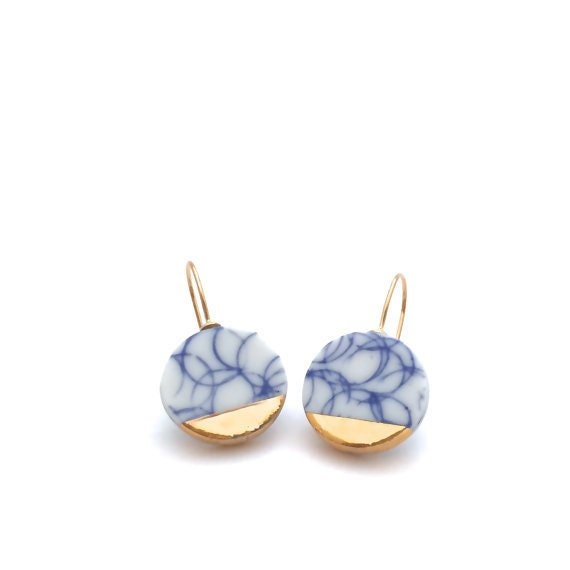 Matching Delft blue earrings in gold handmade out of porcelain. The porcelain earrings are available as 18k solid gold earrings, 14k solid gold porcelain earrings and 24k gold plated sterling silver earrings.

A matching porcelain necklace is available which creates a beautiful porcelain jewelry gift set. 