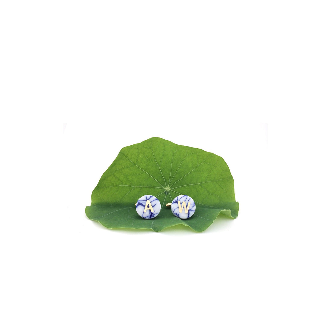 Personalized initial cufflinks handmade from porcelain by OeiCeramics Delft