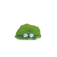 Personalized initial cufflinks handmade from porcelain by OeiCeramics Delft
